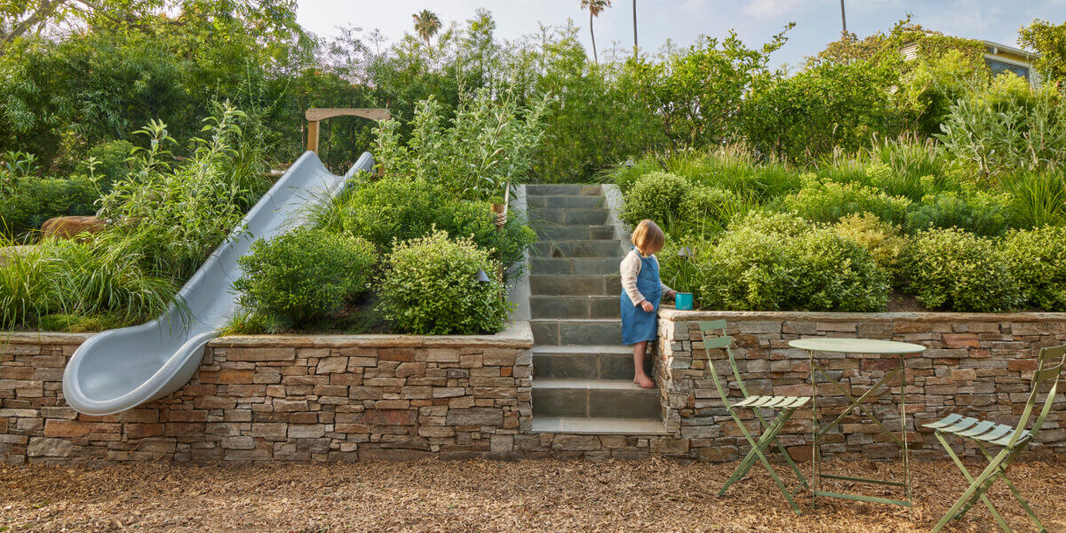 Family garden with a large lawn and play area